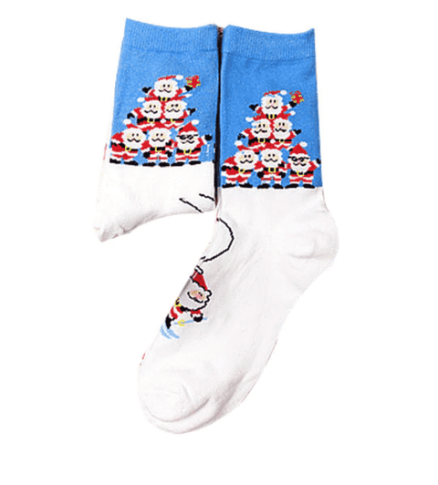 A pair of white socks with a pyramid of Santa's